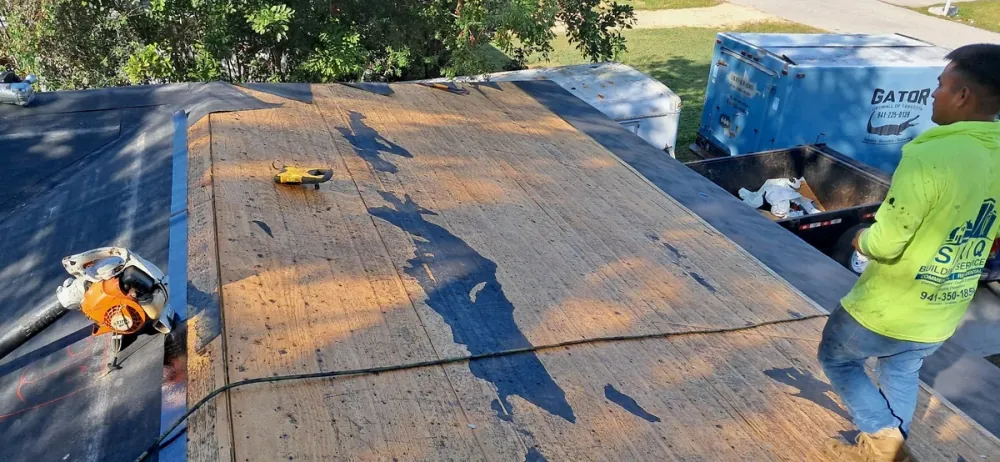 SRQ Building Services urgent roof repair and emergency tarping response in Sarasota, FL