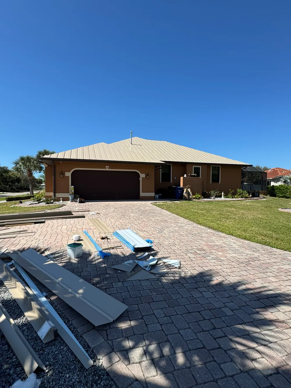 Completed residential metal roof installation on a Sarasota, FL home by SRQ Building Services