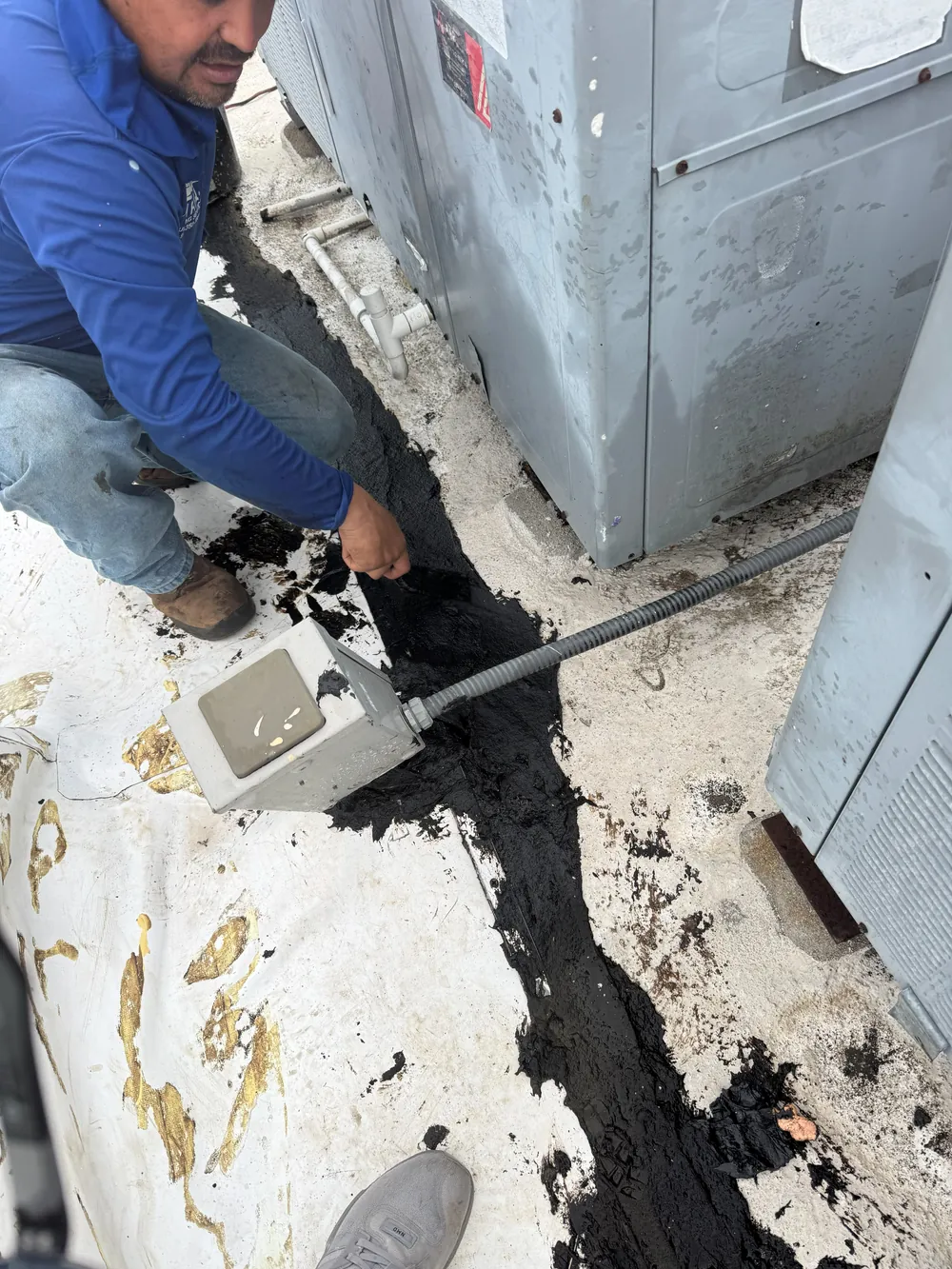 SRQ crew performing a detailed roof inspection scope walkthrough in Sarasota