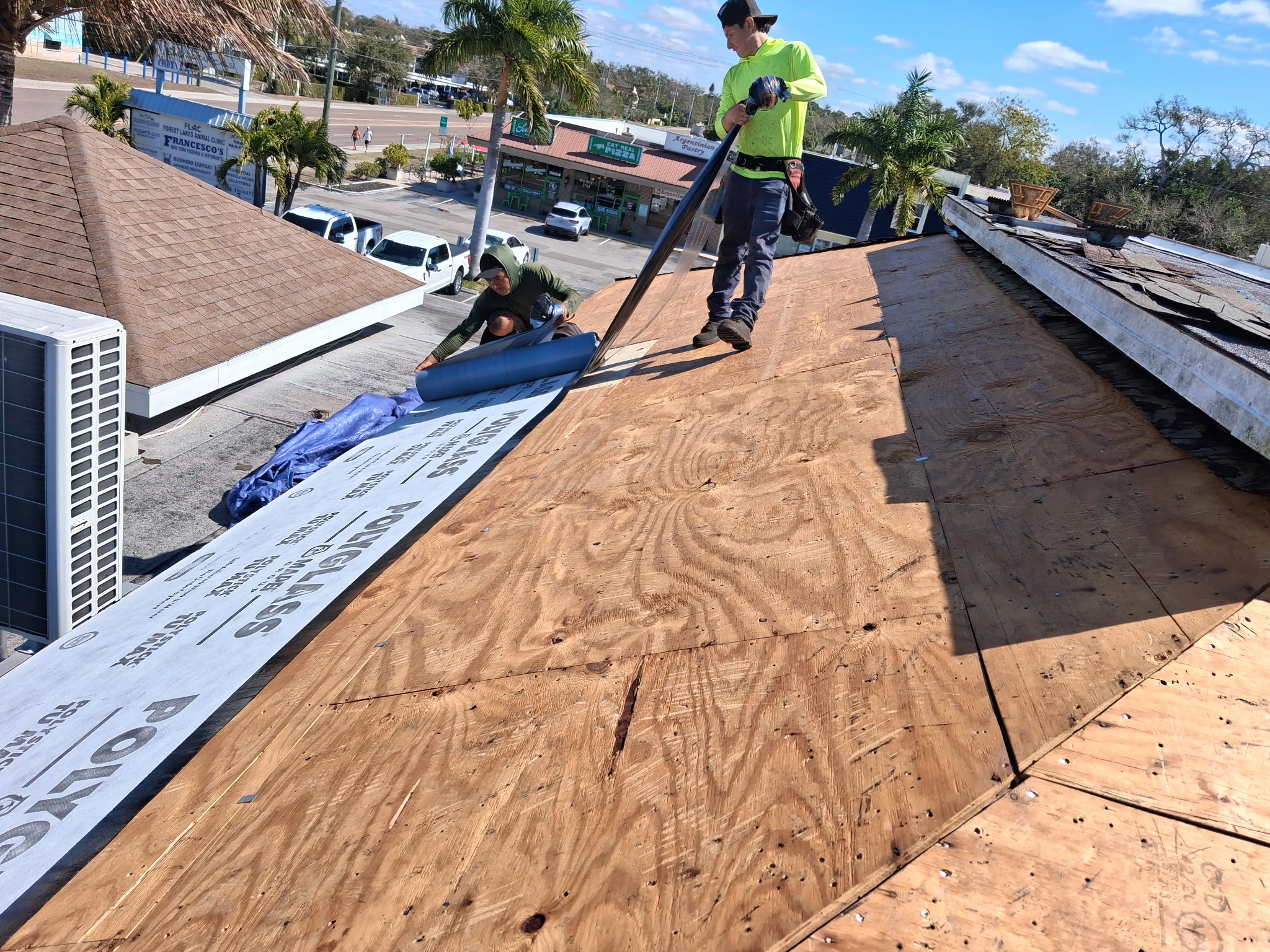 Roof inspection in progress on a Sarasota home by SRQ Building Services